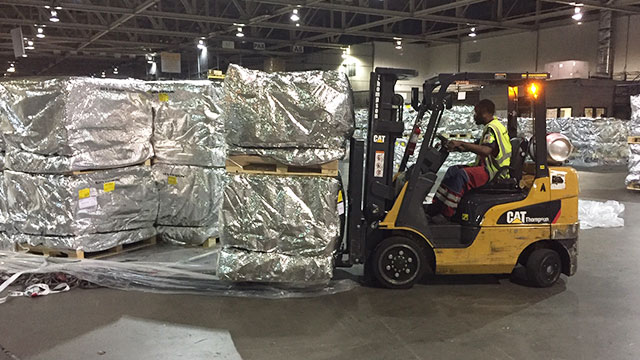 Pallets being consolidated onto a ULD (Unit Loading Device)